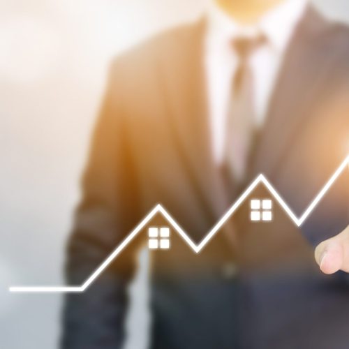 Business development to success and growing growth concept. Businessman pointing red arrow graph corporate future growth plan Business development to success and growing growth concept. Businessman pointing red arrow graph corporate future growth plan